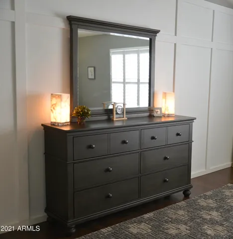 a dining room with furniture and window