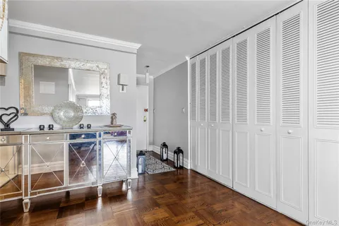 a view of a bathroom from a hallway
