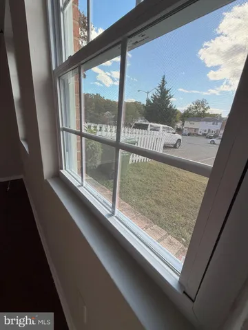 a view of balcony with furniture