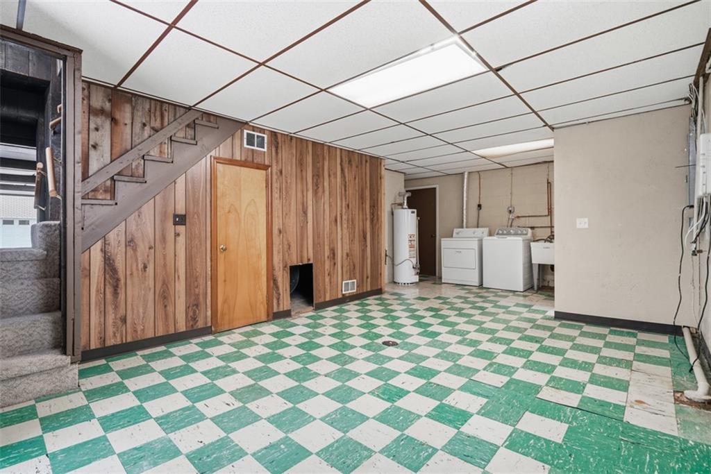 268 Coraopolis Road Coraopolis, PA 15108 - Photo 33 of 50 This 24x17 partially finished space provides potential for a gym, home office, or simply storage. Washer and dryer included. The door beyond the hot water tank is additional storage.