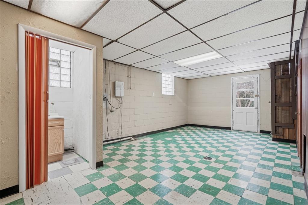 268 Coraopolis Road Coraopolis, PA 15108 - Photo 34 of 50 Walkout access to the backyard and the 1/2 bath can be seen here.