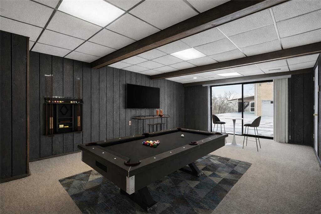 268 Coraopolis Road Coraopolis, PA 15108 - Photo 36 of 50 The 19x14 game room is virtually staged here to get you excited about the possibilities! This is a great room for entertaining or staying in and watching a movie.