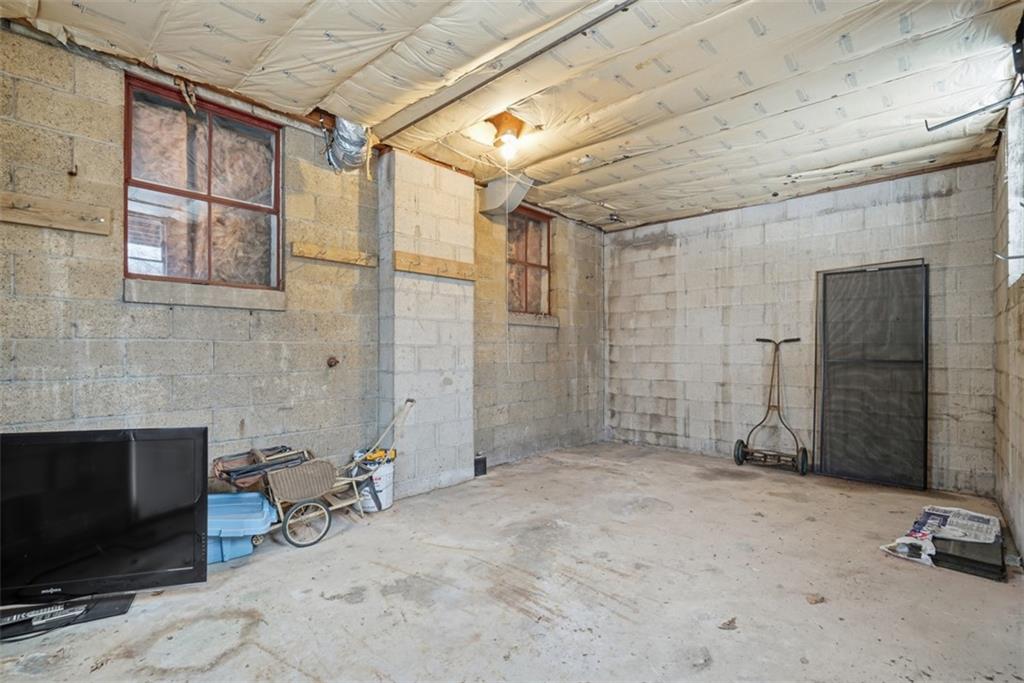 268 Coraopolis Road Coraopolis, PA 15108 - Photo 40 of 50 Under the primary bedroom with the balcony is this gem of a storage space! It's like a built in shed, that can bed accessed from an exterior door.