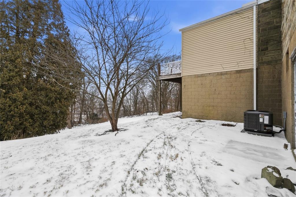 268 Coraopolis Road Coraopolis, PA 15108 - Photo 45 of 50 There is a flat area on the side yard, tucked away right outside of the door in the partially finished area of the basement. Perfect spot to fence in for a dog or for a play area for the kids.