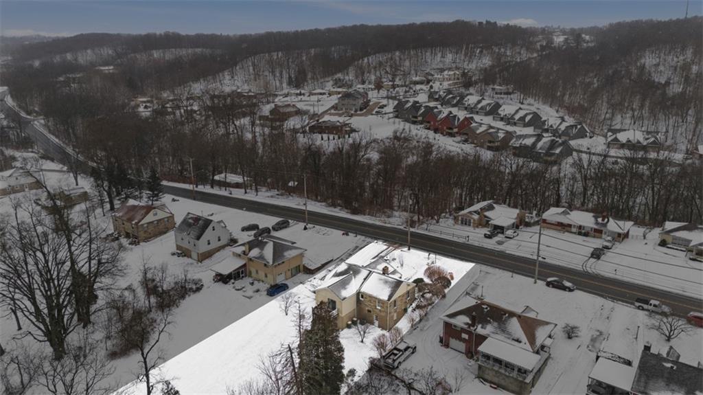 268 Coraopolis Road Coraopolis, PA 15108 - Photo 48 of 50 Across the street and beyond those homes you see Sir Henry's Haven. This gives a little perspective to the location. Just a few minutes down the road to the left is Kennedy Township for shopping, gas, and recreation.