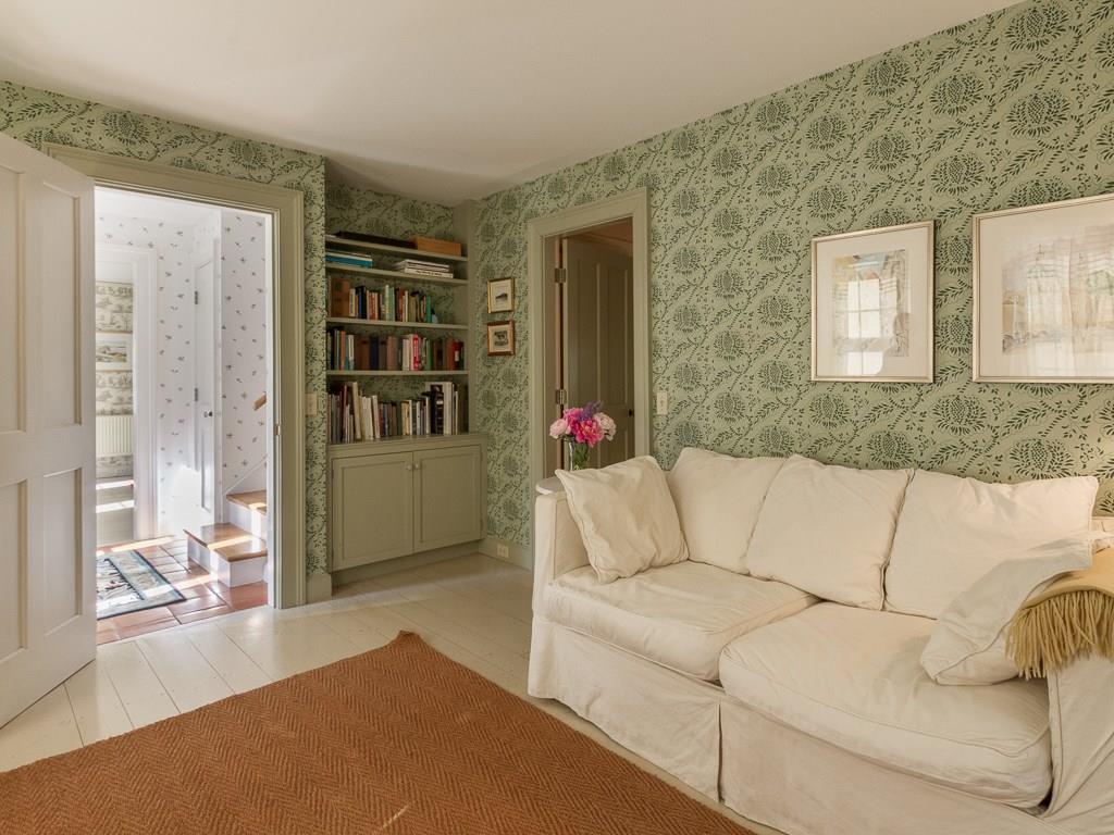 4 Cove End Road Mount Desert, ME 04662 - Photo 5 of 24 A den with built-in shelves and...