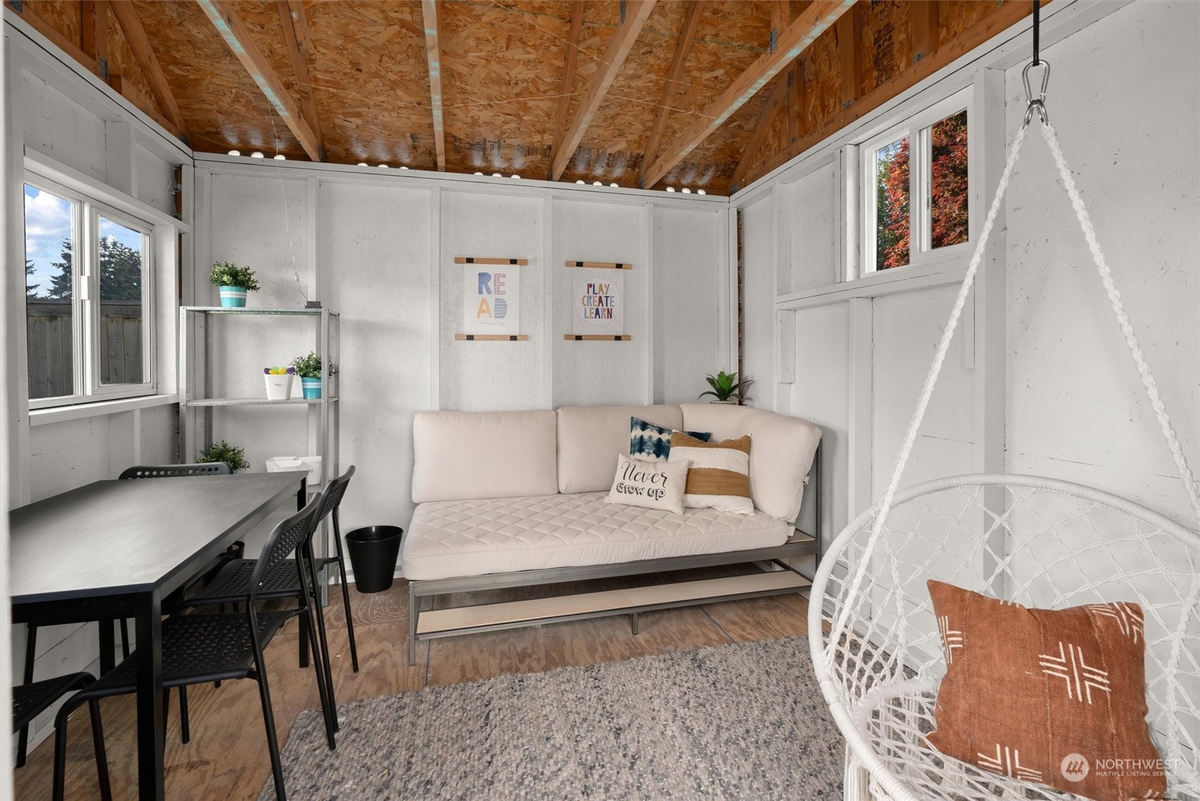 1509 242nd Street Southeast Bothell, WA 98021 - Photo 34 of 40 a living room with furniture and wooden floor