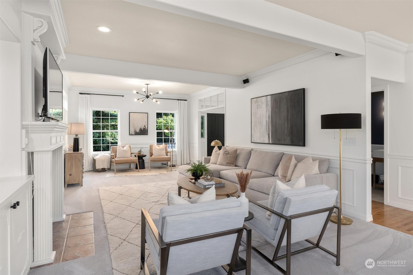 1509 242nd Street Southeast Bothell, WA 98021 - Photo 6 of 40 a living room with fireplace furniture and a flat screen tv