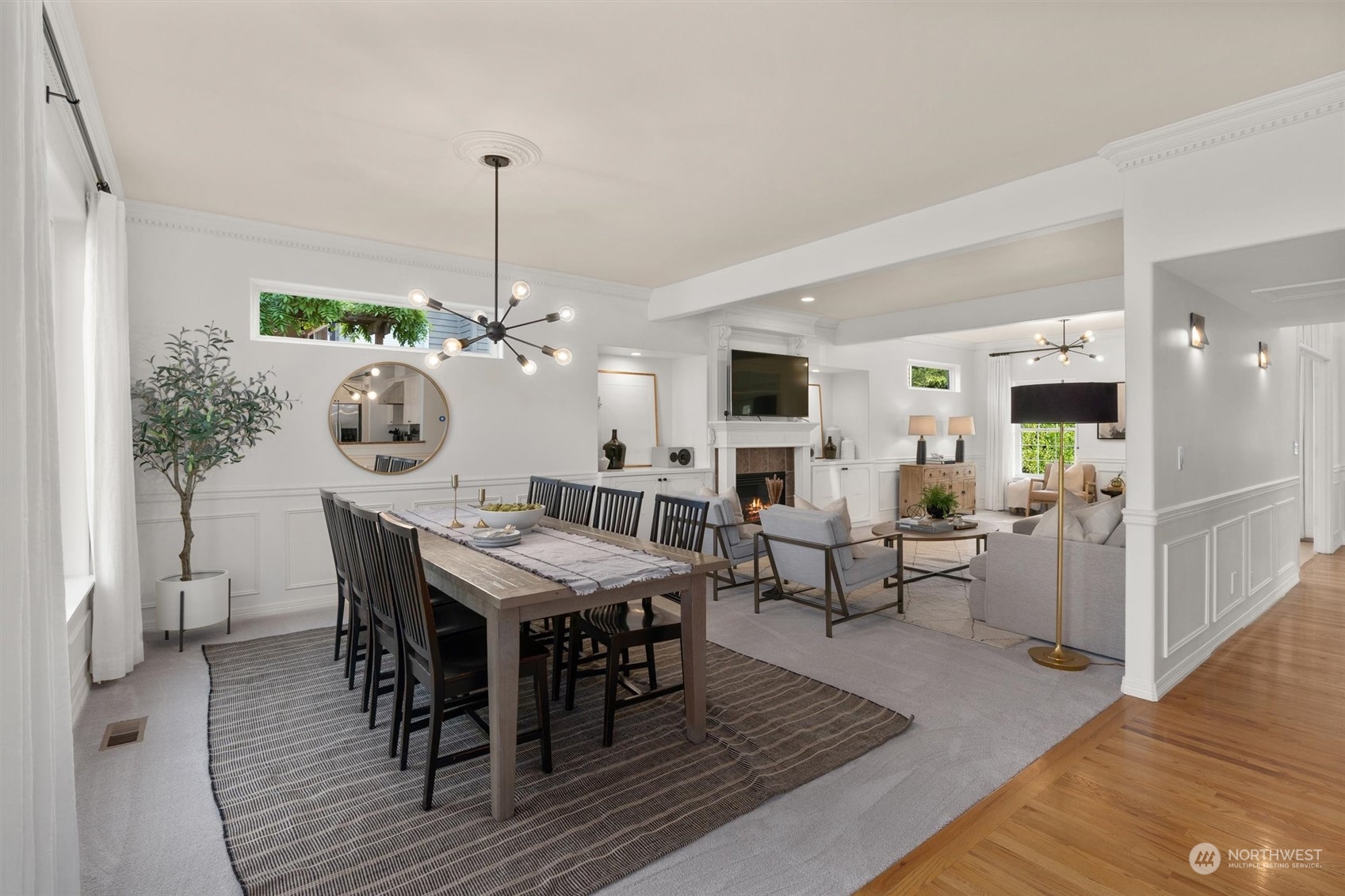 1509 242nd Street Southeast Bothell, WA 98021 - Photo 9 of 40 a view of a dining room with furniture and wooden floor