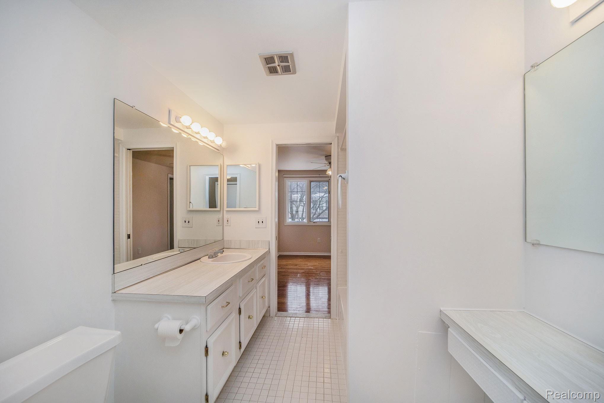 3443 Crooks Road Royal Oak, MI 48073 - Photo 14 of 30 Spacious master bedroom shares a Jack & Jill style master bath.
