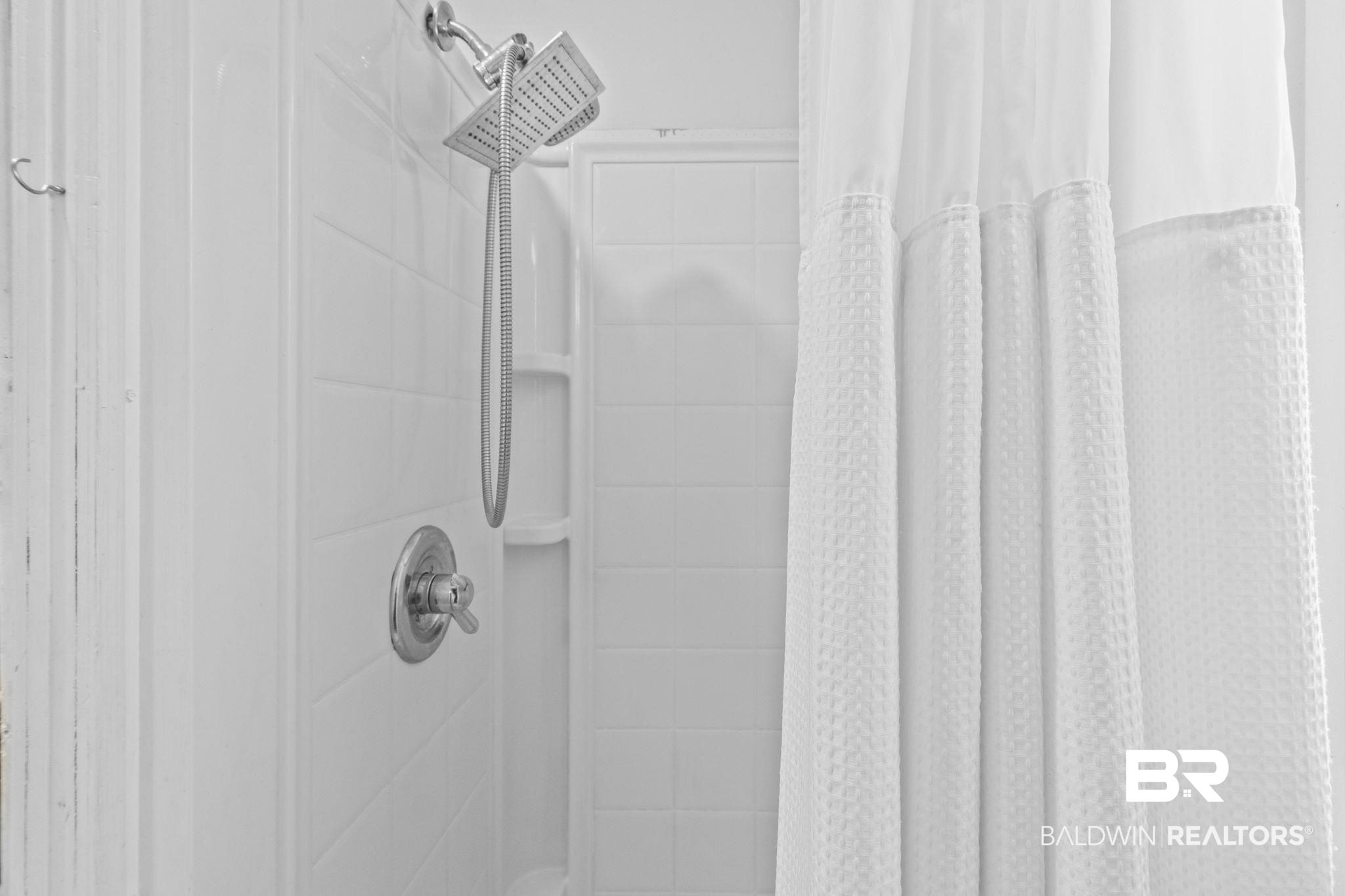 707 North Cedar Street Foley, AL 36535 - Photo 30 of 69 Bathroom featuring a shower with shower curtain
