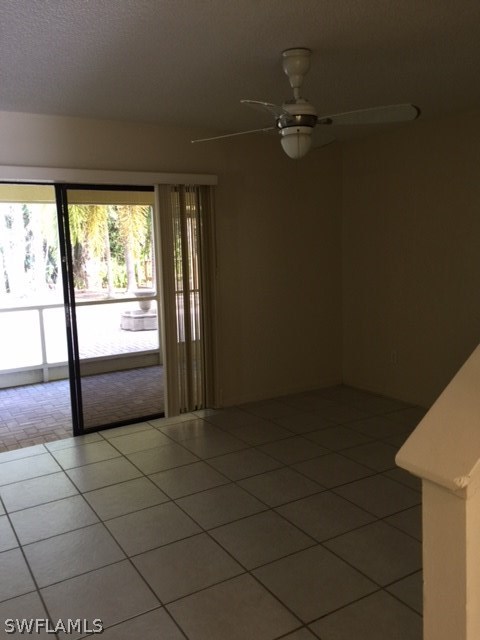 7251 Albany Road Fort Myers, FL 33967 - Photo 15 of 23 a view of a livingroom with an empty space and a window