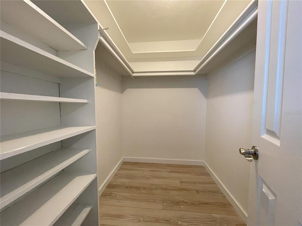 250 Rosery Road Northwest, Unit 329 Largo, FL 33770 - Photo 15 of 27 a view of an empty walk in closet