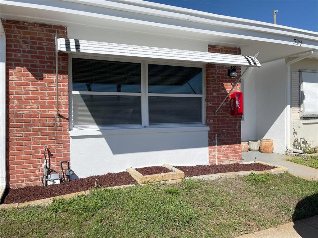 250 Rosery Road Northwest, Unit 329 Largo, FL 33770 - Photo 21 of 27 a view of outdoor space and deck