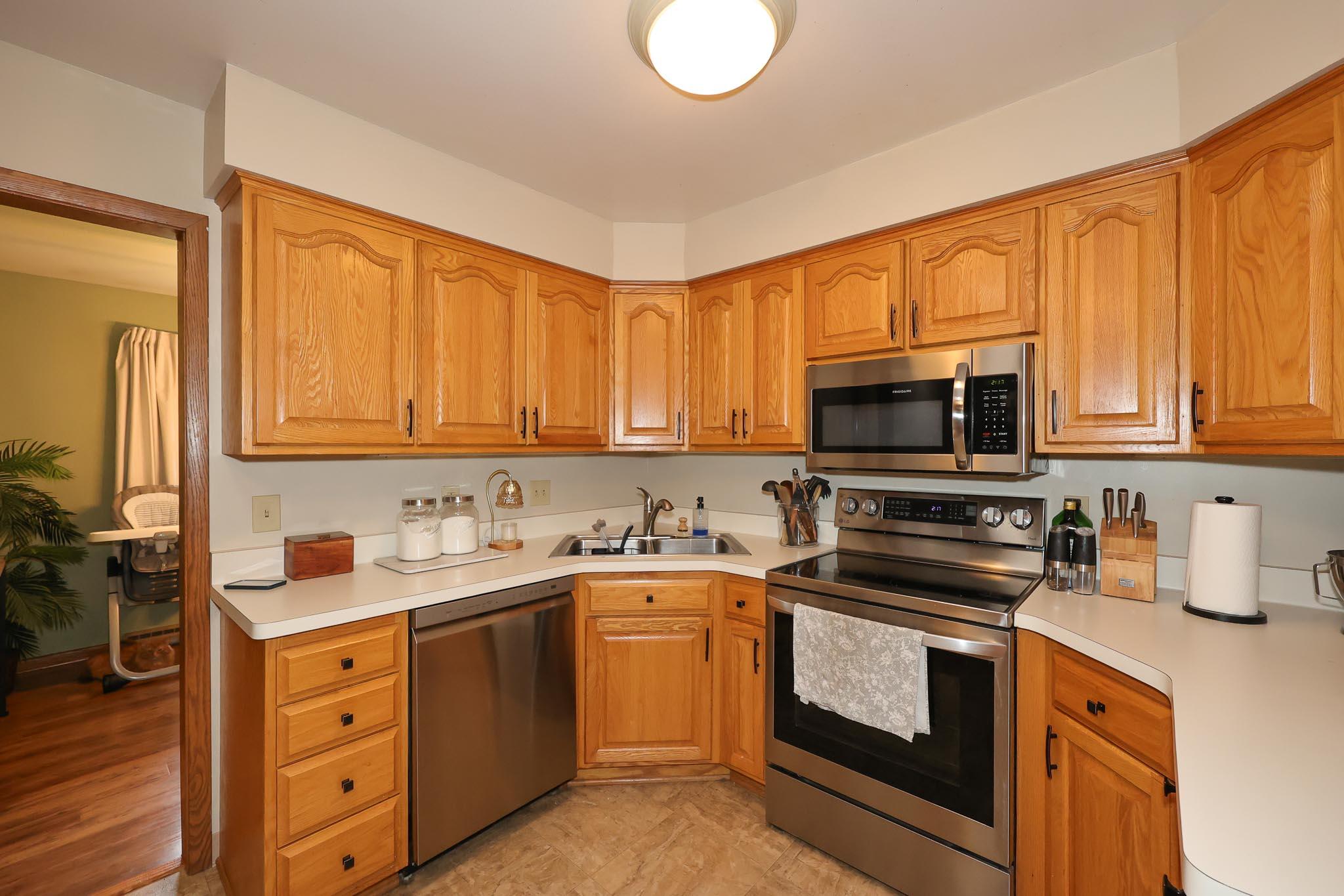 1408 South Emmertsen Road Mount Pleasant, WI 53406 - Photo 11 of 32 Kitchen with plenty of cabinets.