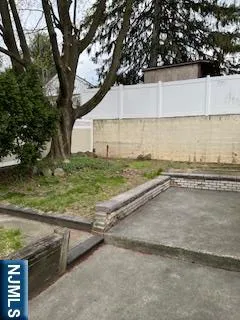 a view of a yard with an outdoor space