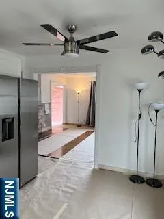 a view of a hallway with a chandelier