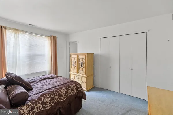 a backyard of a house with outdoor seating