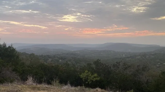 a view of a city and mountains