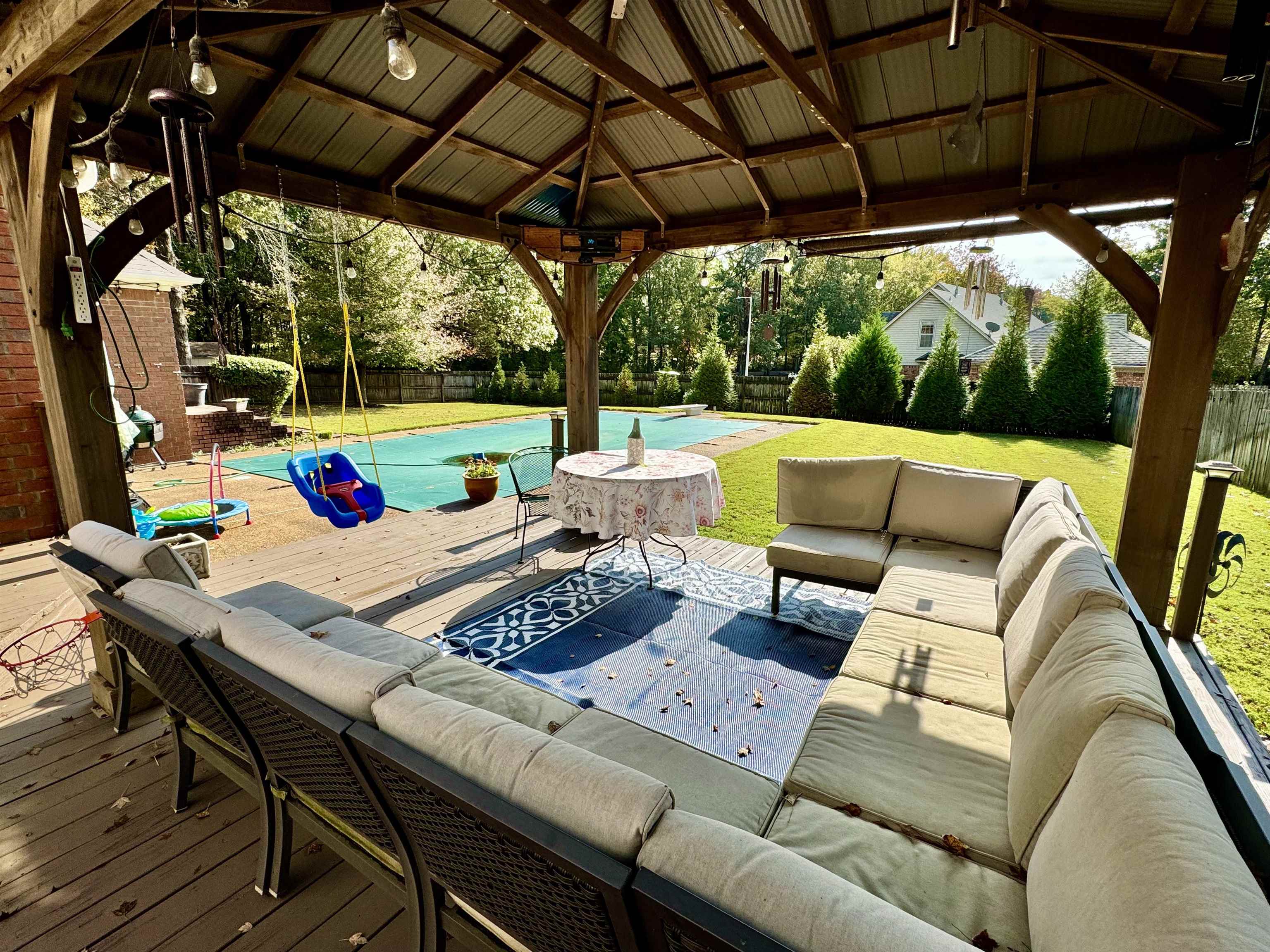 7359 Crestridge Road Memphis, TN 38119 - Photo 31 of 38 View of patio with a gazebo, outdoor lounge area, and a swimming pool side deck