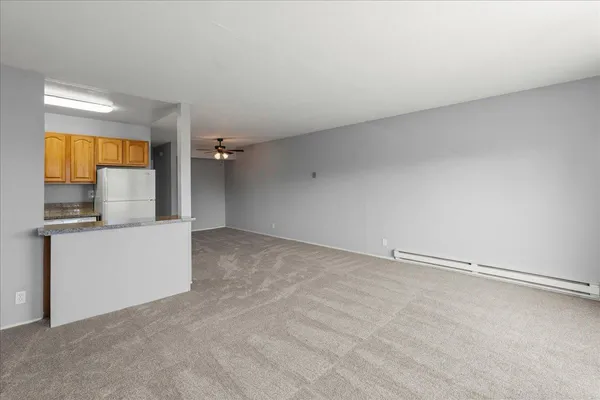 a view of an empty room and window