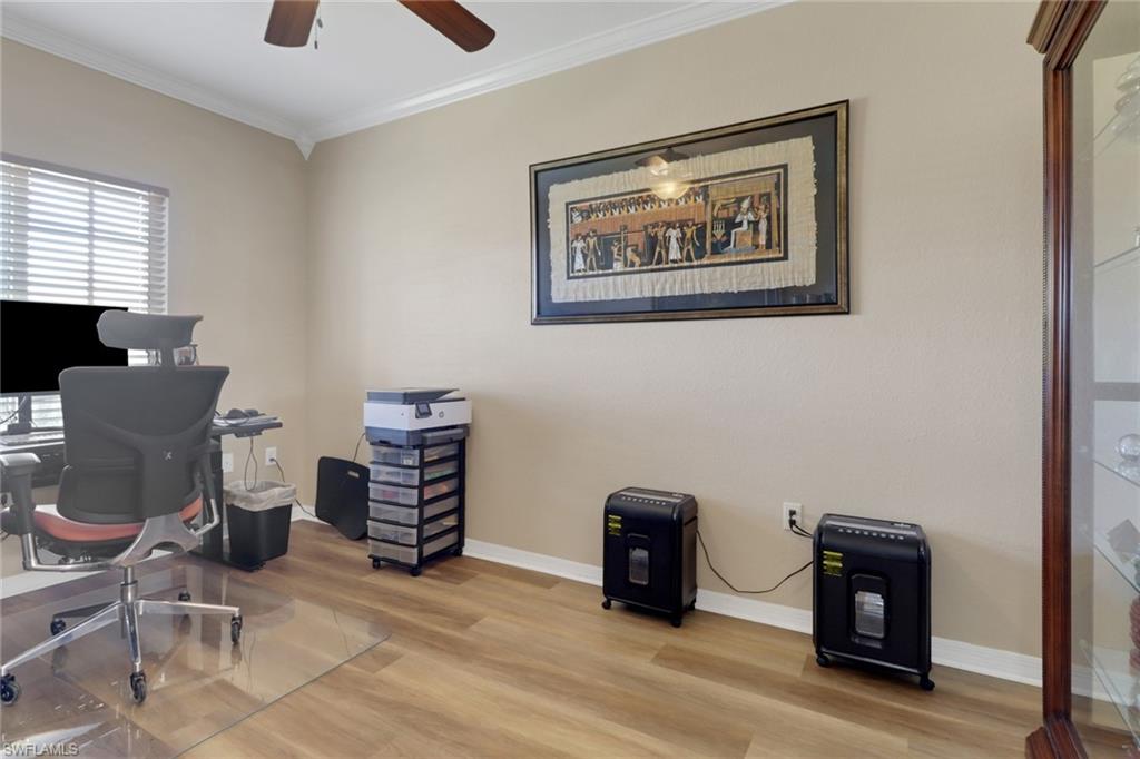 20121 Estero Gardens Circle, Unit 203 Estero, FL 33928 - Photo 16 of 40 a view of workspace with furniture and window