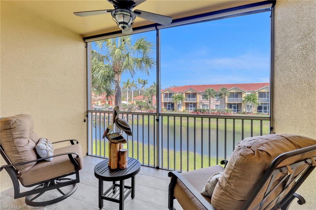 20121 Estero Gardens Circle, Unit 203 Estero, FL 33928 - Photo 23 of 40 a bedroom with furniture and a window