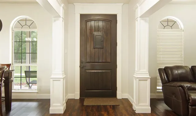 a view of a livingroom with furniture and wooden floor