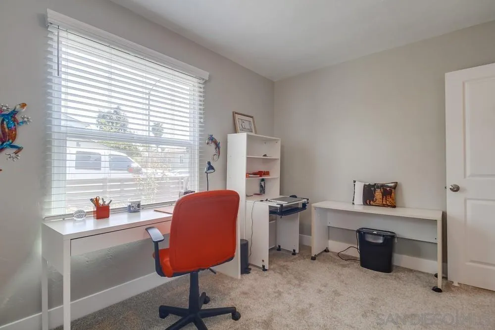 730 Pidgeon Street San Diego, CA 92114 - Photo 23 of 39 a room with furniture and a window