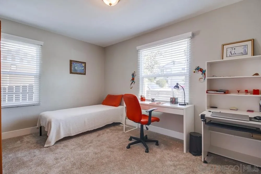 730 Pidgeon Street San Diego, CA 92114 - Photo 25 of 39 a bedroom with a bed and a window