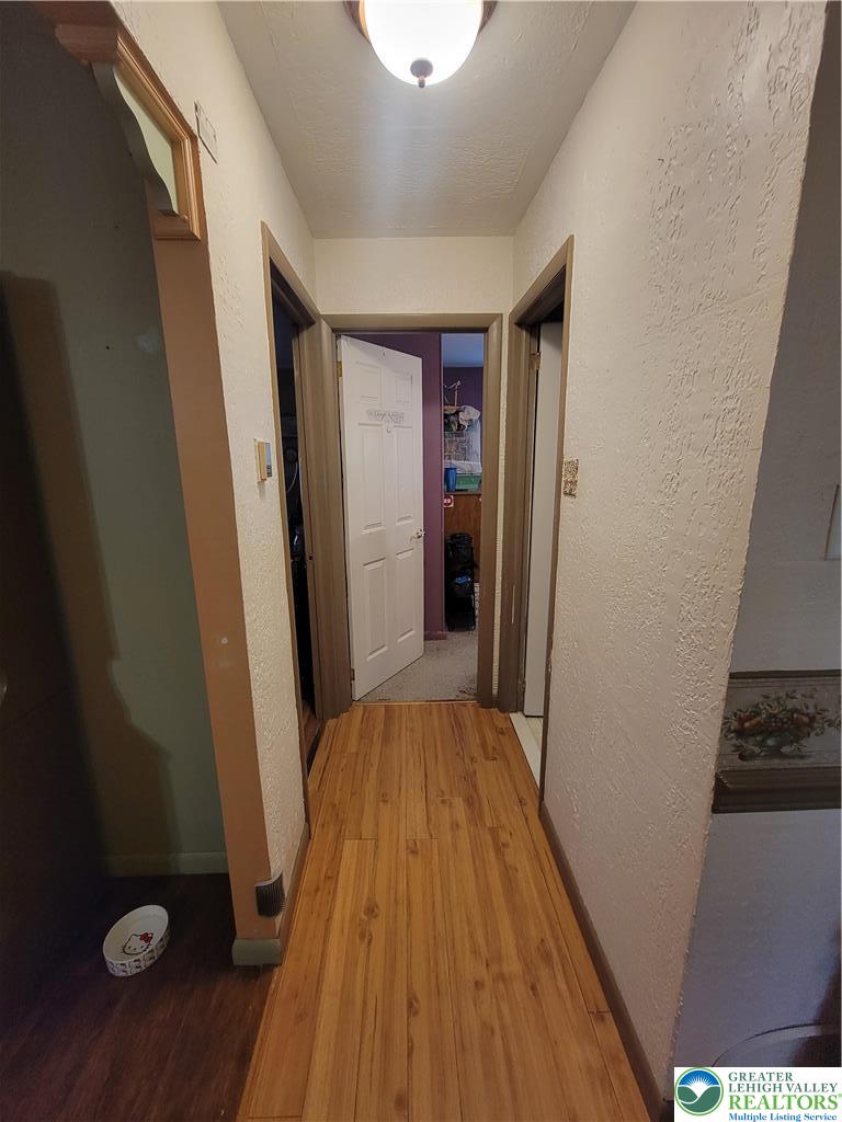 320 Hillside Street Forest City, PA 18421 - Photo 11 of 24 a view of a hallway and wooden floor