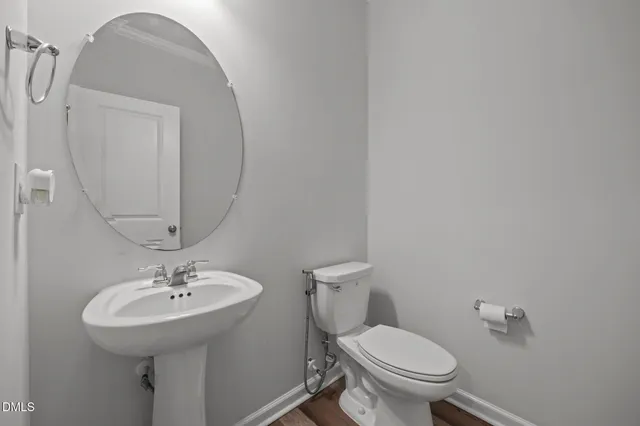 a spacious bedroom with a bed and a window