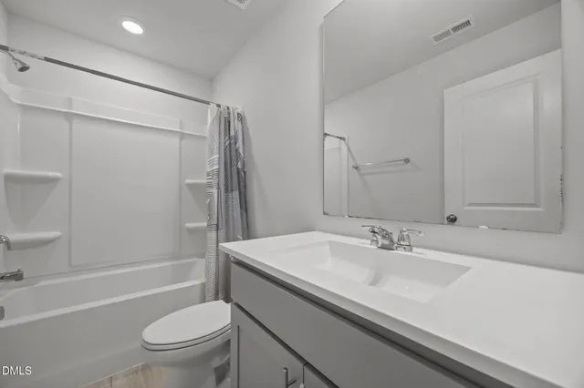 a balcony view with a seating space