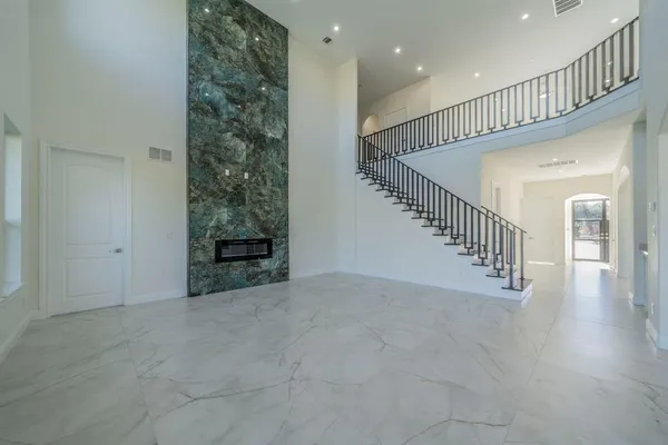 a view of an entryway with stairs