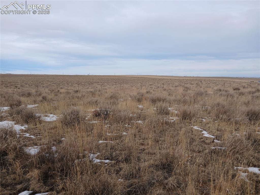 15 Squirrel Creek Road Colorado Springs, CO 80928 - Photo 9 of 12 an aerial view of residential houses with outdoor space