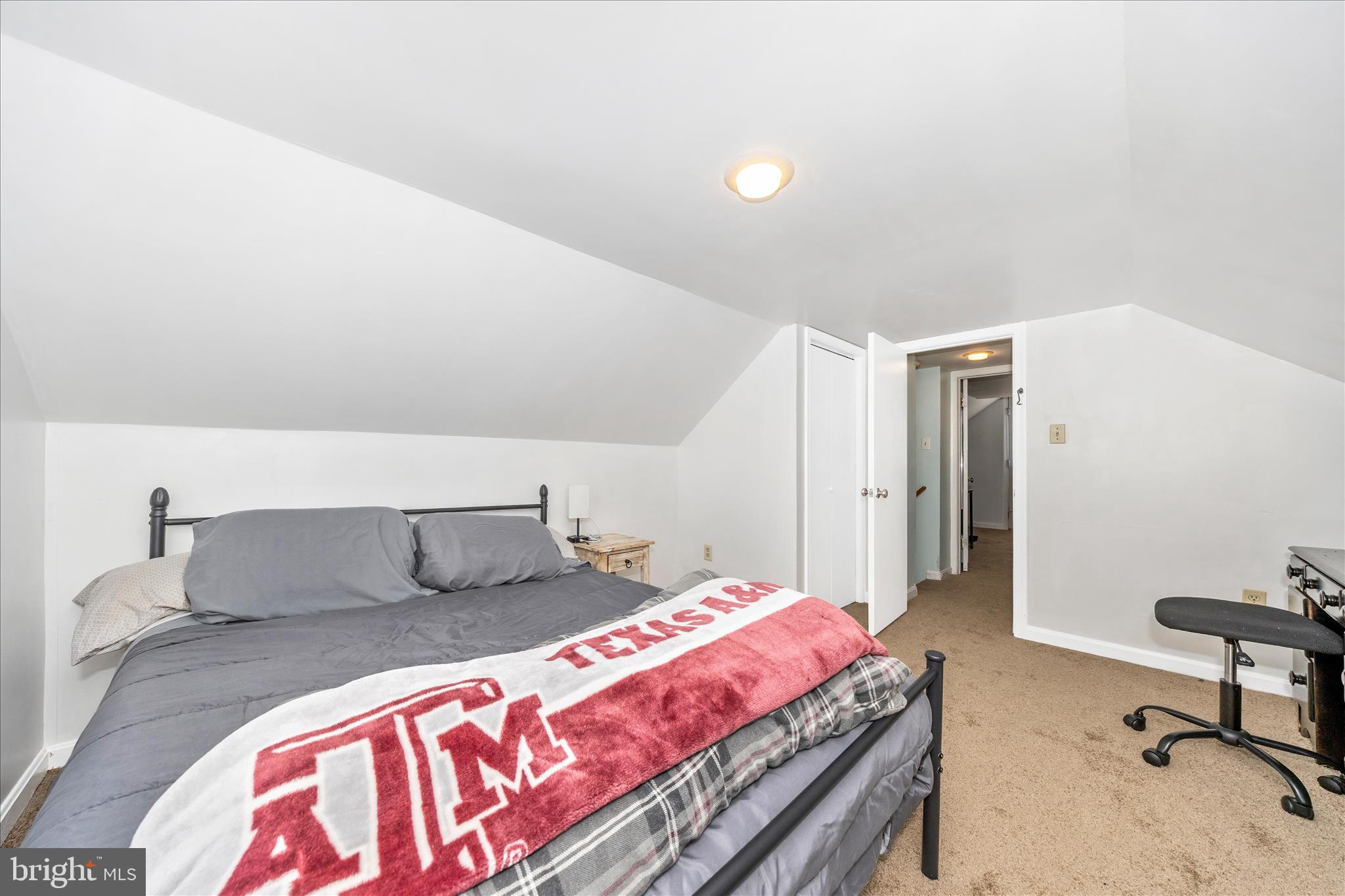 5618 Bartonsville Road Frederick, MD 21704 - Photo 28 of 53 a bedroom with a bed and a table in it