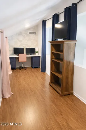 a kitchen with stainless steel appliances a stove sink and cabinets