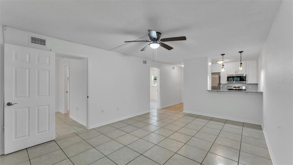 141 Fernery Road, Unit D1 Lakeland, FL 33809 - Photo 11 of 30 a view of an empty room and kitchen view