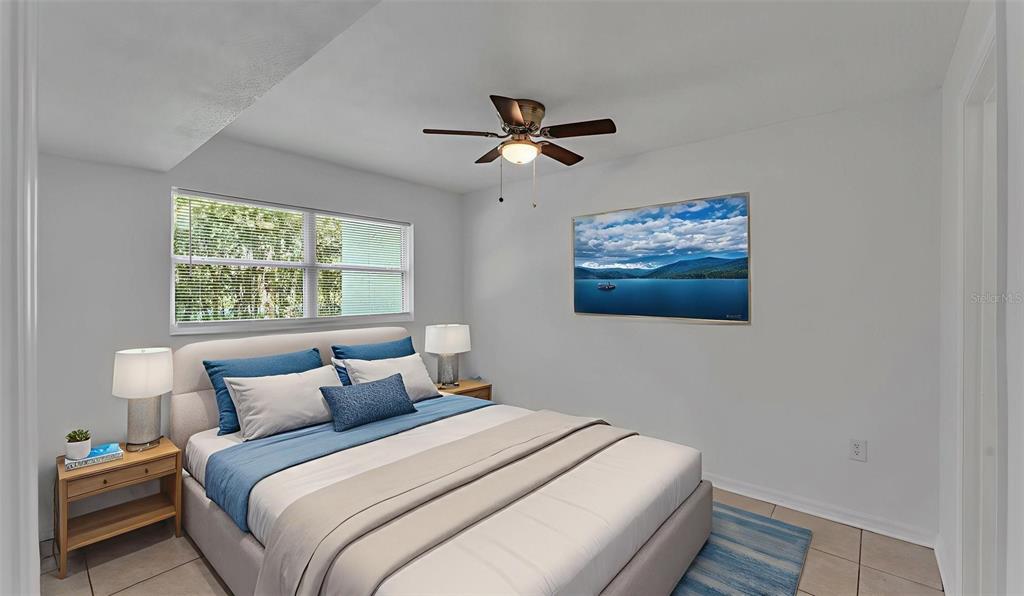 141 Fernery Road, Unit D1 Lakeland, FL 33809 - Photo 15 of 29 a bedroom with a bed and a window