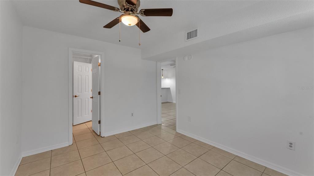 141 Fernery Road, Unit D1 Lakeland, FL 33809 - Photo 16 of 29 wooden floor in an empty room