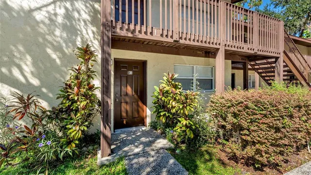 a front view of a building with garden