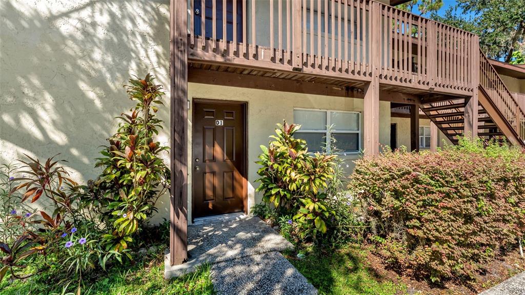 141 Fernery Road, Unit D1 Lakeland, FL 33809 - Photo 2 of 30 a front view of a building with garden