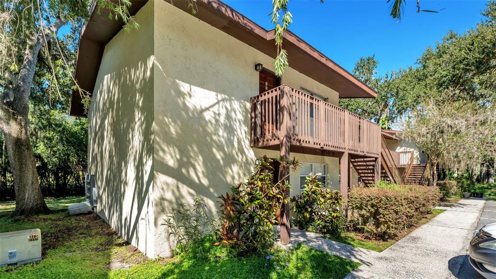 141 Fernery Road, Unit D1 Lakeland, FL 33809 - Photo 30 of 30 a view of a house with a yard
