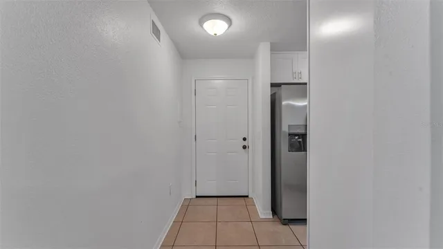a kitchen with sink and window