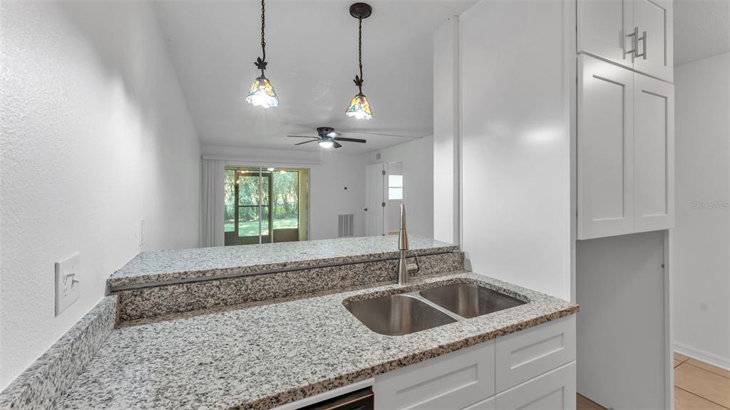 141 Fernery Road, Unit D1 Lakeland, FL 33809 - Photo 10 of 30 a kitchen with sink and window