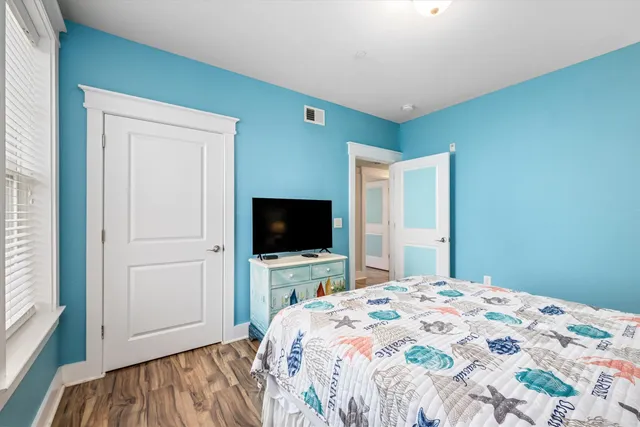 a swimming pool with outdoor seating and yard