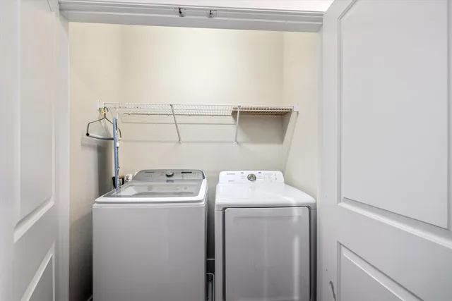 a view of a house with swimming pool and sitting area