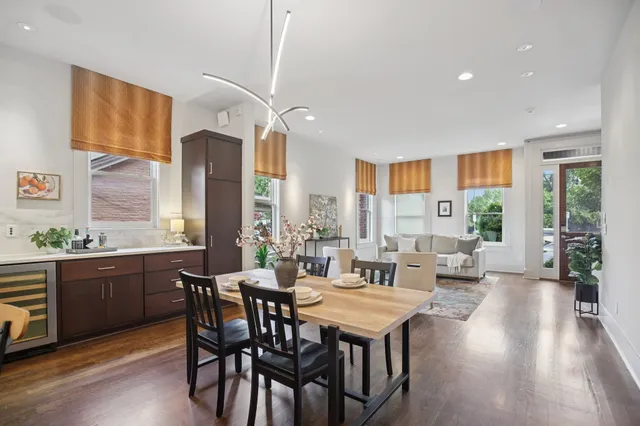 a kitchen with a sink and a refrigerator