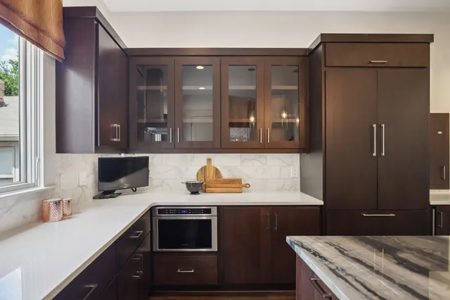 a bathroom with a sink and shower