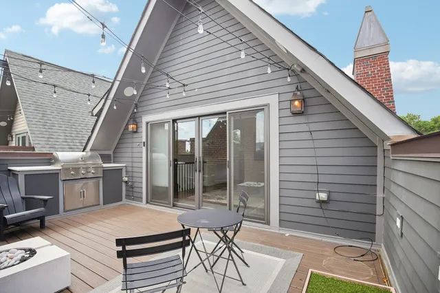 an aerial view of residential houses with green space